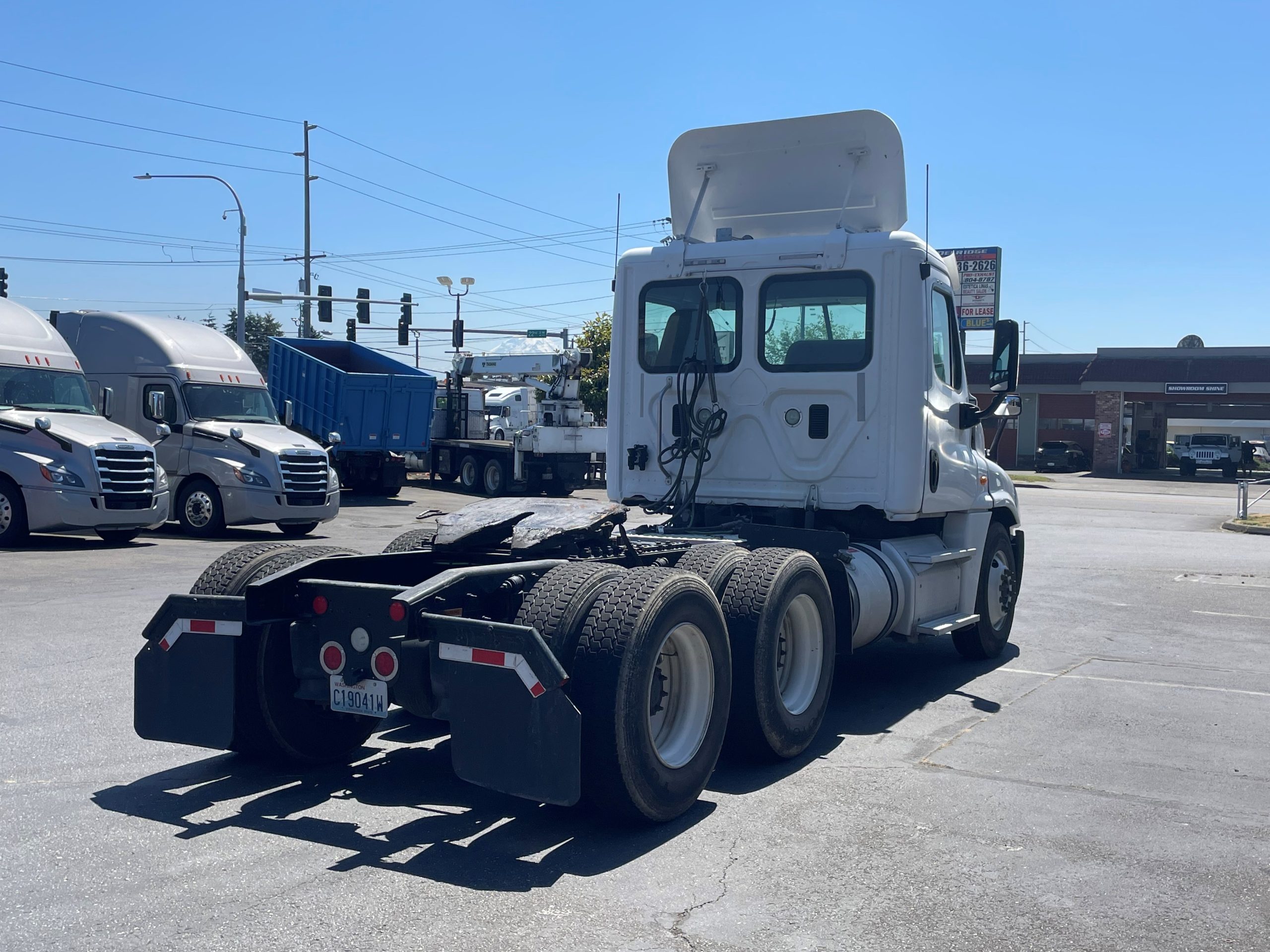 2014 FREIGHTLINER CASCADIA 125 PASSENGERS-SIDE-REAR-1-scaled